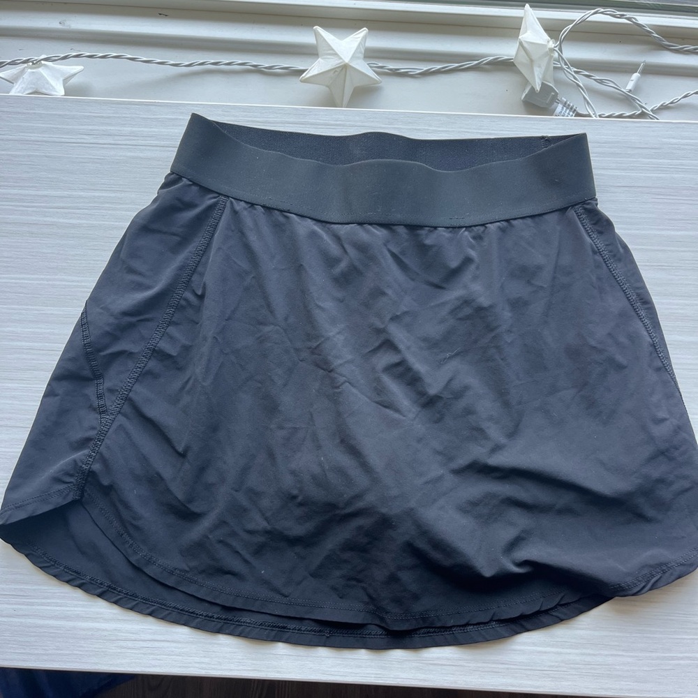 TNA Aritzia black tennis skirt